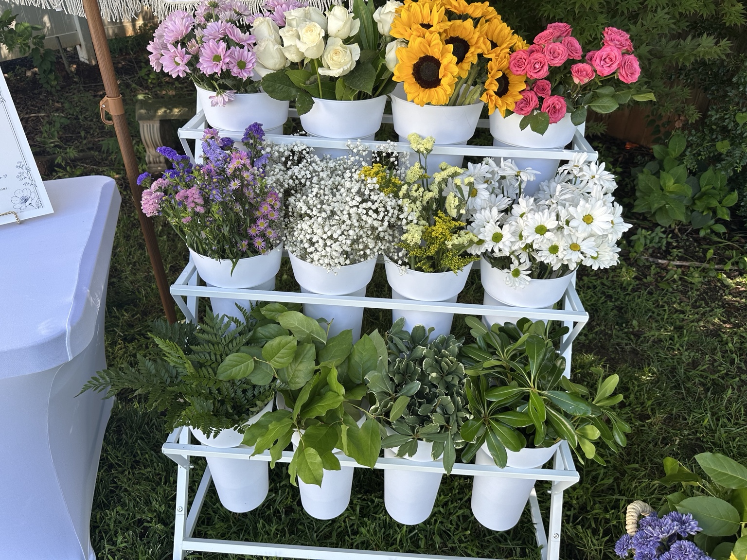 Fresh flowers and greenery arranged on The Garden Social NC bloom bar